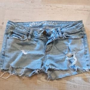 Distressed denim shorts